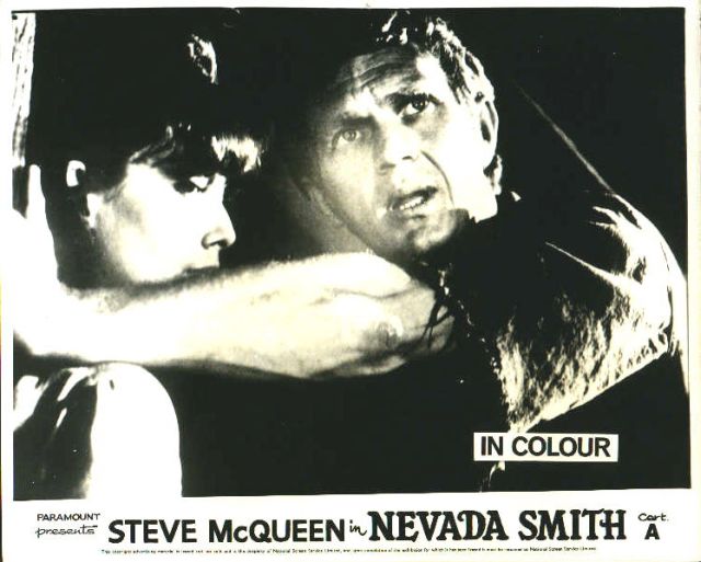 Max (McQueen) plans his escape with 
Pilar (played by Suzanne Pleshette).